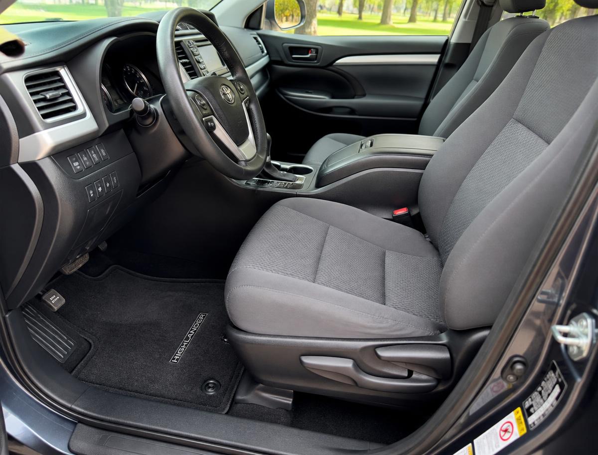 Clean fabric car seats and floor mats after a professional interior cleaning